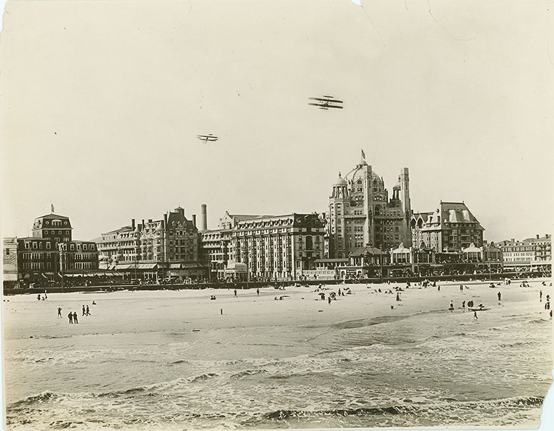 Biplanes fly over Atlantic City at the 1910 Air Carnival.