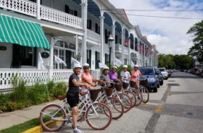 Cyclists stop at the landmark Chalfonte Hotel on Curious Cape May's new guided bike tour.