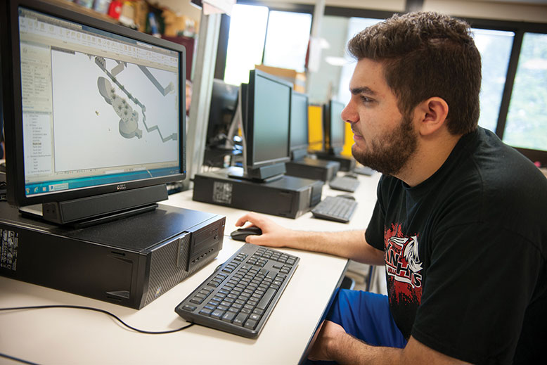 Zachary Brosse refines a project for West Essex Regional High School's 11th garde CAD 3 (computer-assisted design) architecture class.