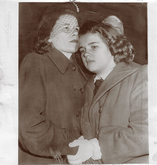 Sally leans on her mother, Ella Horner, minutes after being reunited.