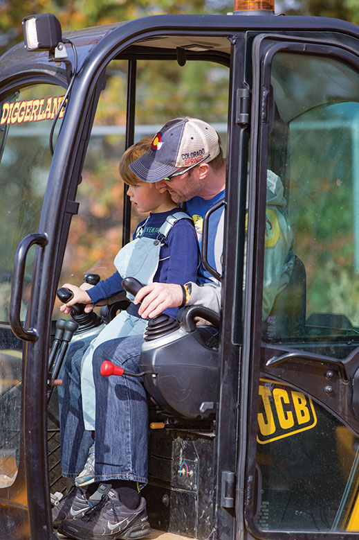 JR Ignosh and his dad, of Emmaus, Pennsylvania, in an excavator.