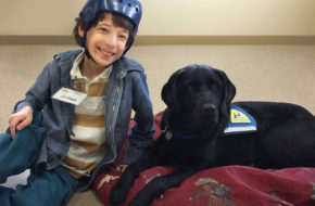 Gemini, a specially trained service dog, helps her pal Julian get to school each weekday morning. Julian, 12, has cerebral palsy.