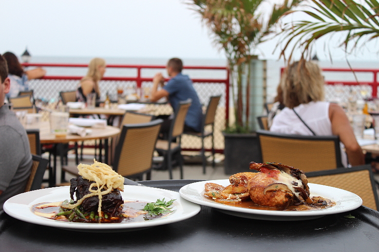 Food and patrons at Stella Marina in Asbury Park, which overlooks the ocean.