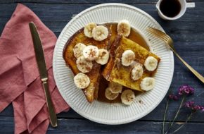 French toast topped with banana slices and syrup at Sabrina’s Café in Collingswood.