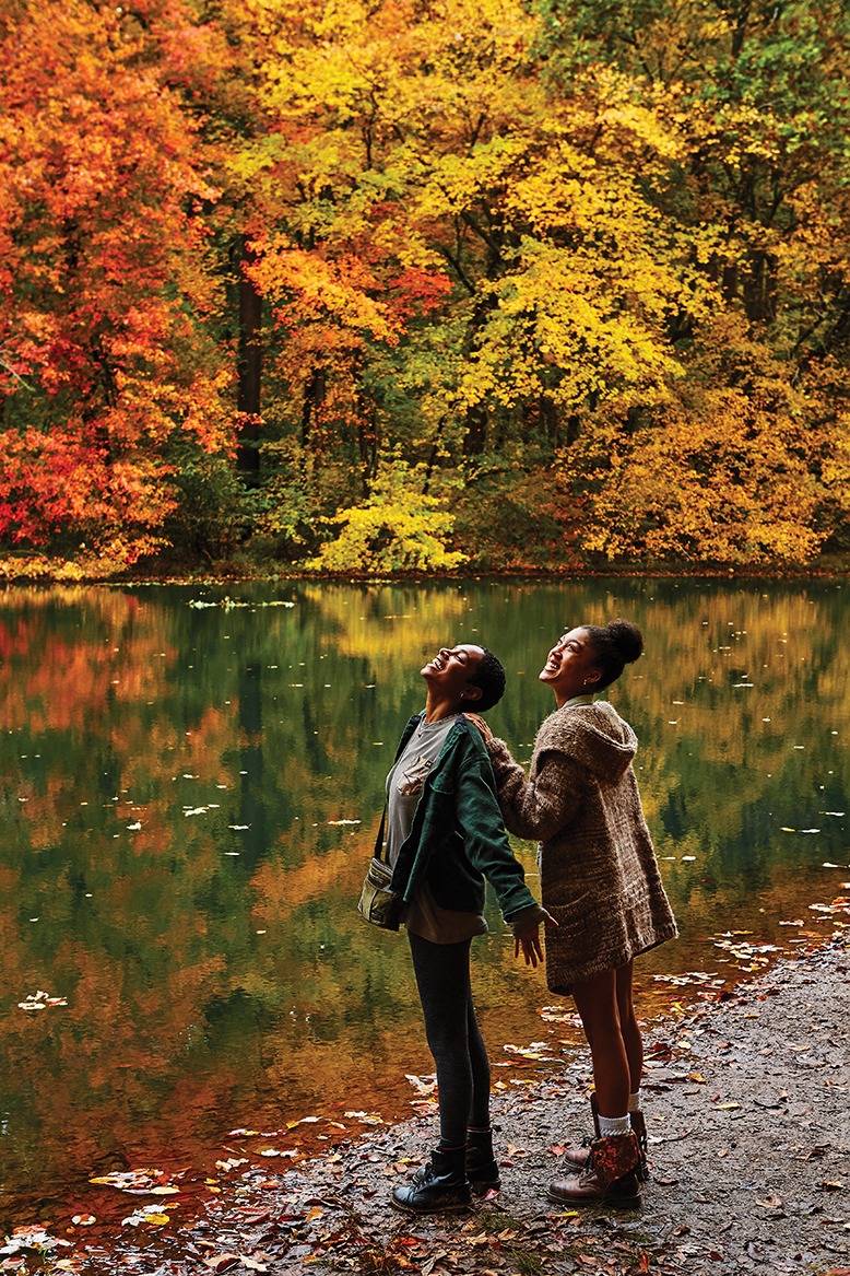 Friends admire Lake Surprise at Watchung Reservation.