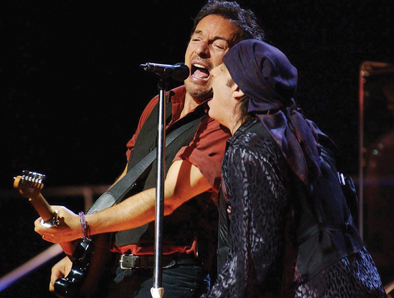 Bruce Springsteen performing with Steven Van Zandt.