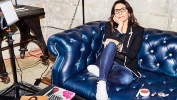 Bobbi Brown lounges on a blue couch in her Montclair office.