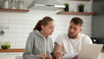 couple looking at a laptop