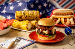Items from barbecue on a patriotic tabletop