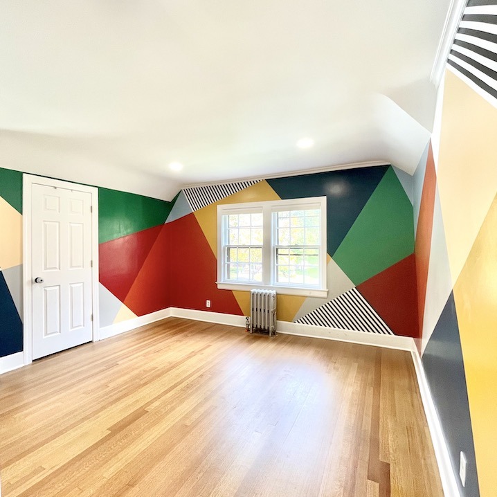 room with geometric mural