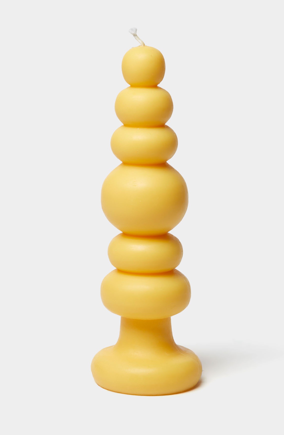 Sculptural yellow candle from 54 Celsius 