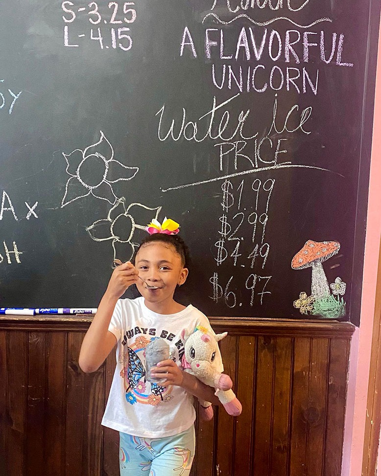 Child eating ice cream at Ummm Ice Cream Parlor