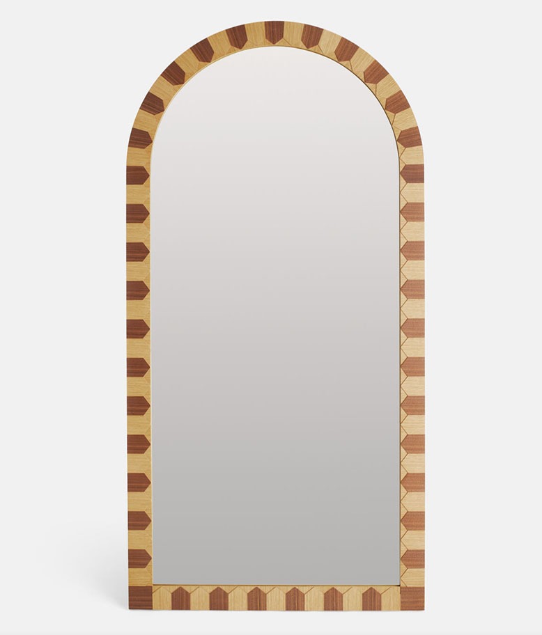 Oversized mirror with wood-patterned frame