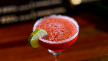 Margarita in glass, garnished with lime