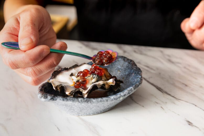 Kumamoto oyster with marinated salmon roe and Japanese Hokkaido uni at Hadaka in Asbury Park