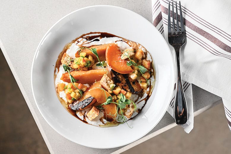 Peaches with corn salsa, stracciatella cheese and croutons at Black Sheep Bar & Provisions in Garwood