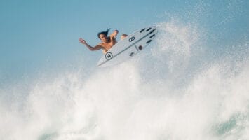 Surfer Rob Kelly on top of a huge wave