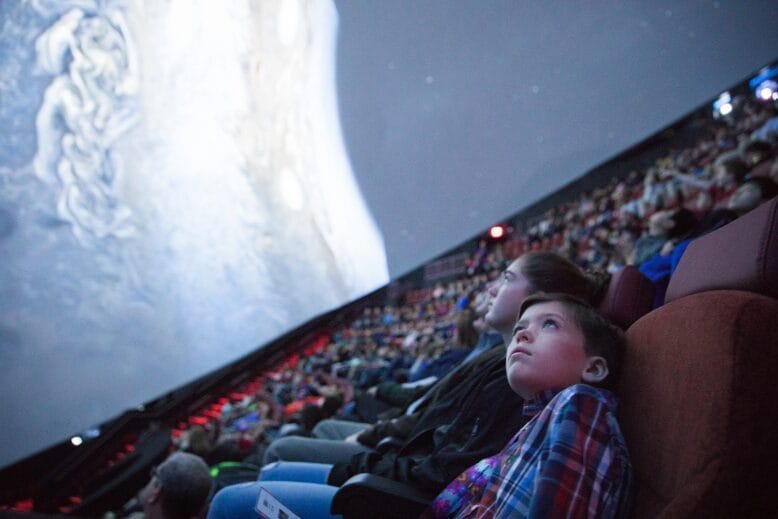 Kids in Jennifer Chalsty Planetarium at Liberty Science Center in Jersey City