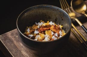 Squid congee with charred corn, millet and chanterelle mushrooms at Ram & Rooster in Metuchen, New Jersey