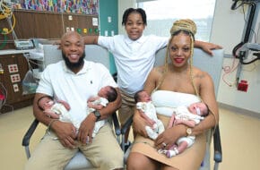 Proud parents Aja Kennon and Emmanuel Volmar with son EJ, 9, and quadruplets Ean, Evan, Alayha and Eamon.