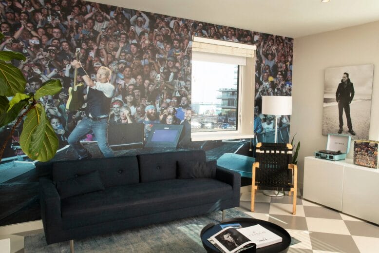 A giant photo of the E Street Band's 2024 Sea Hear Now concert on the wall in the Boss Suite at the Asbury Hotel in Asbury Park, New Jersey