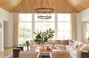 In Westfield, NJ, a large open family room with an expansive chandelier above.