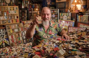 Richard L. Greene shows off a Fralinger’s Original Salt Water Taffy matchbook from his collection of 750,000.