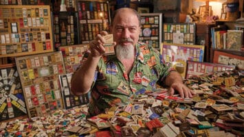 Richard L. Greene shows off a Fralinger’s Original Salt Water Taffy matchbook from his collection of 750,000.