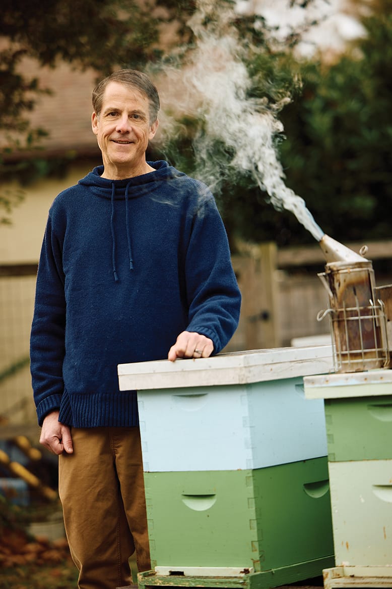 Trenton-based beekeeper Mark Leckington with his backyard bee colonies