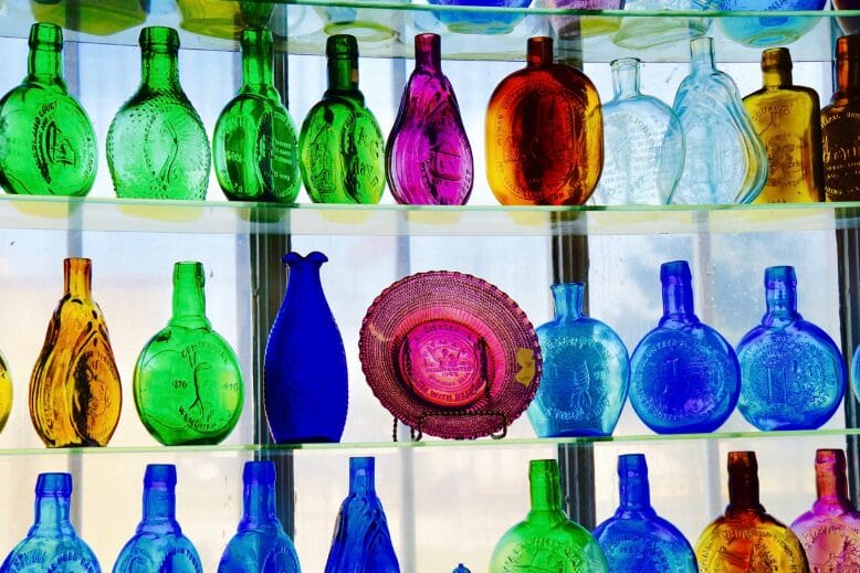 Rows of colorful glassware at the Heritage Glass Museum in Glassboro, NJ