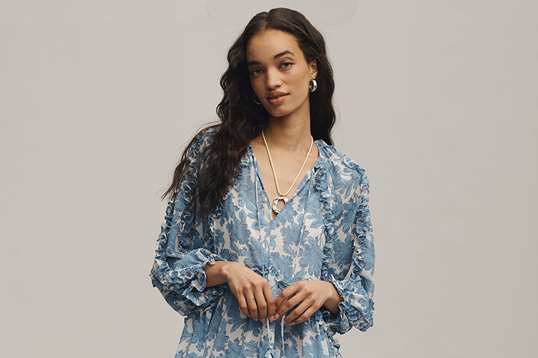 Woman in blue floral dress