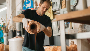 Jono Pandolfi, whose tableware appears on Hulu's "The Bear," works on a piece at his studio in Union City, NJ
