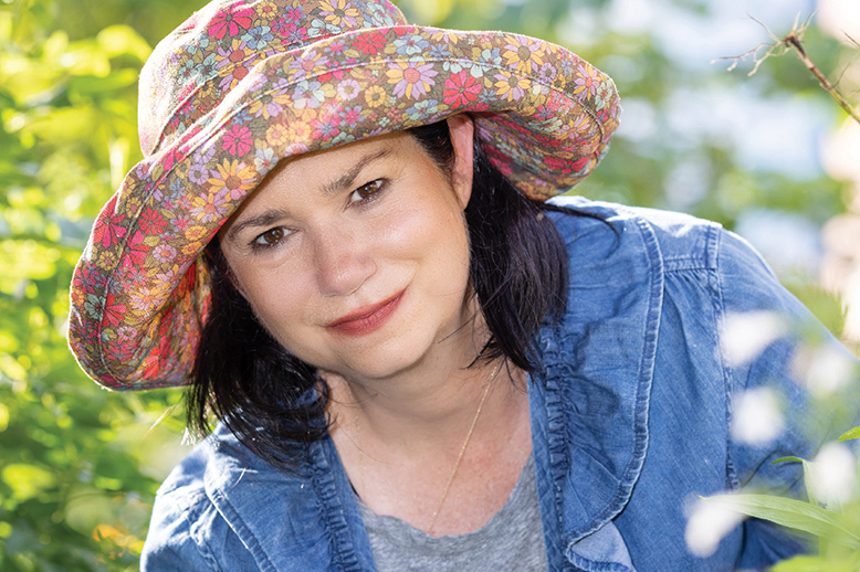 Portrait of New Jersey gardener Kim Correro in the Healing Garden in Jersey City, NJ