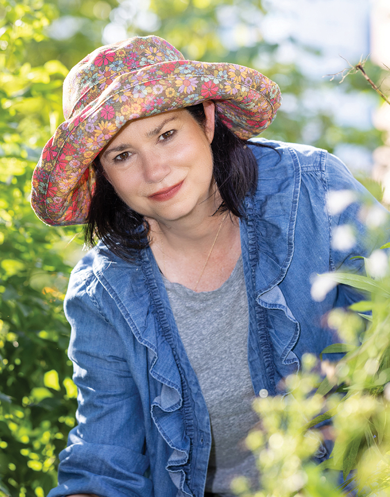 Portrait of New Jersey gardener Kim Correro in the Healing Garden in Jersey City, NJ