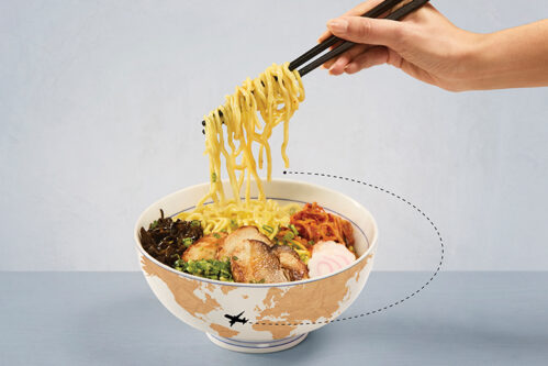 Bowl of ramen with illustration of plane flying around it