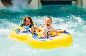 Two children on serpentine tube slide at Thundering Surf Waterpark in Beach Haven in LBI, NJ