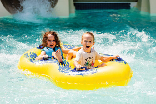 Two children on serpentine tube slide at Thundering Surf Waterpark in Beach Haven in LBI, NJ