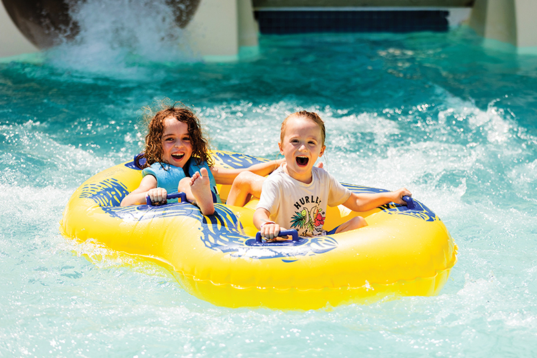 Two children on serpentine tube slide at Thundering Surf Waterpark in Beach Haven in LBI, NJ