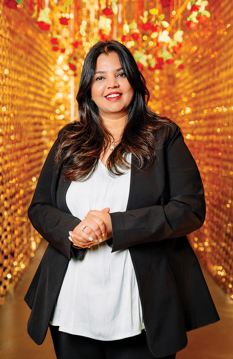 Chef and owner Ruby Bhalla stands in the Instagram-worthy golden tunnel in her restaurant, Thumkaa Bar & Kitchen in Jamesburg, NJ