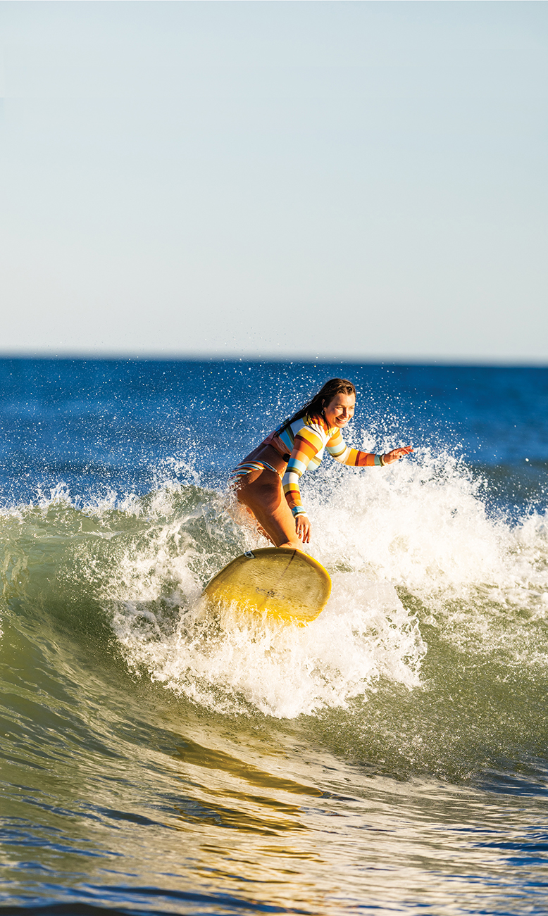 Caroline Duerr surfing at Manasquan Beach, NJ