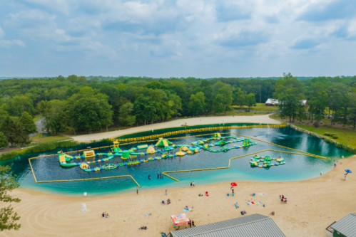 Aerial shot of the Splash Zone, a massive inflatable obstacle course at Darlington Lake in Mahwah, NJ