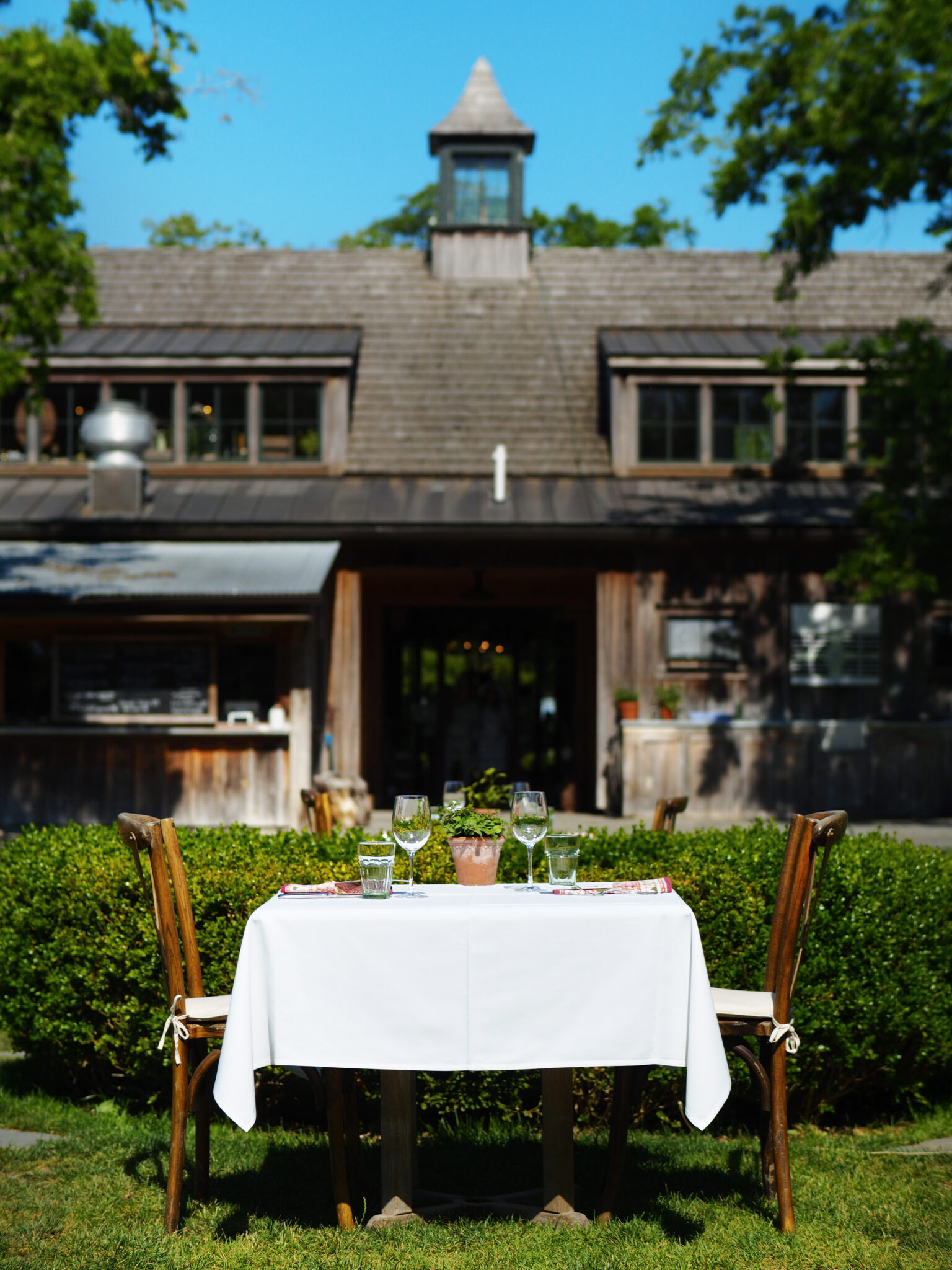 Table in front of barn at Beach Plum Farm in West Cape May, NJ