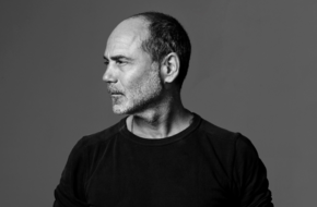 Black-and-white portrait of photographer Timothy White
