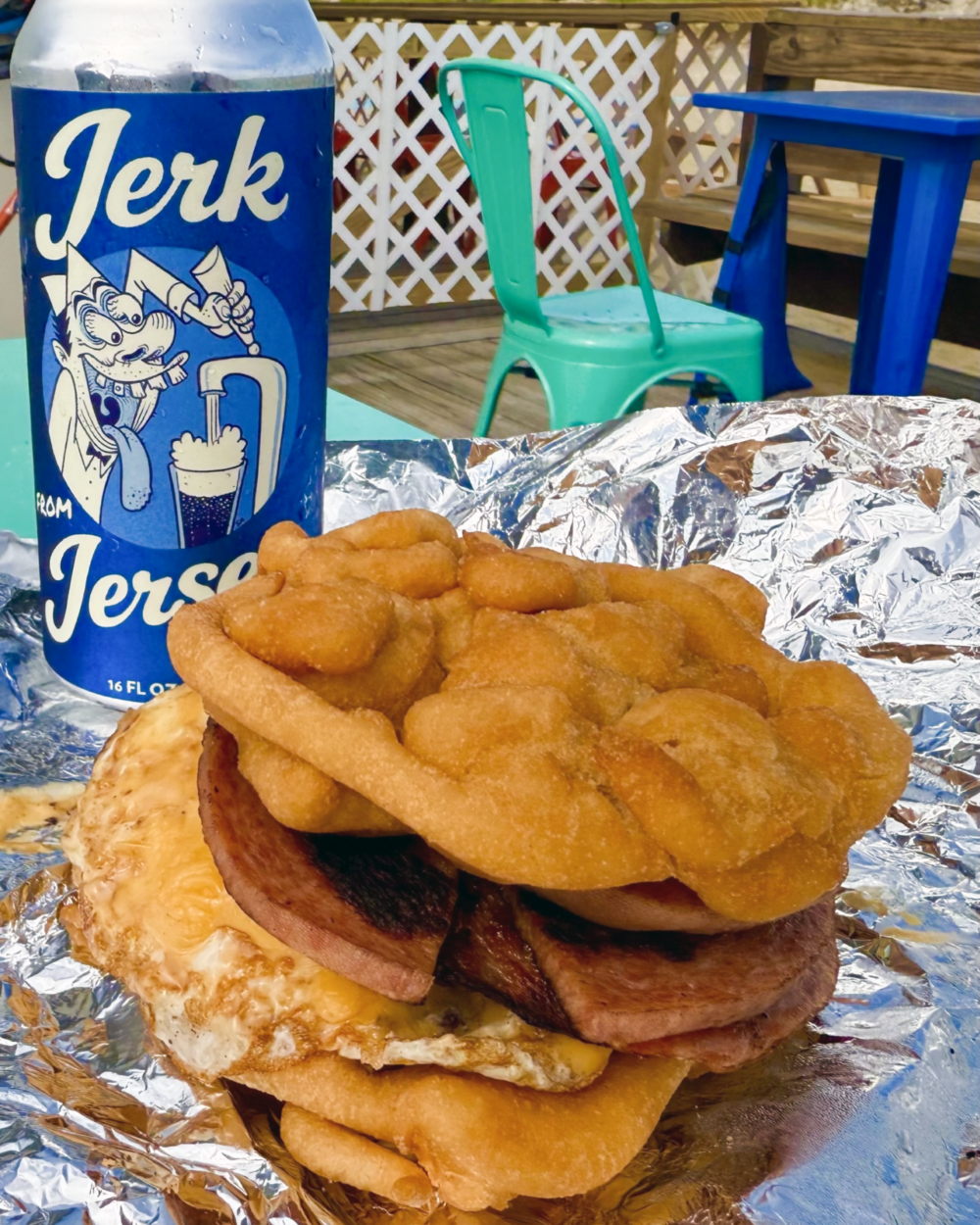 pork roll, egg and cheese sandwich with funnel-cake buns with a side of raspberry ketchup and a soda from Boardwalk Bandit Sandwich and Soda in Bradley Beach, NJ