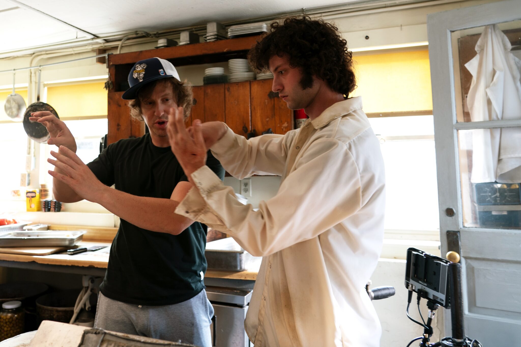 Dominic Sessa (right) with director Matt Johnson on the set of "Tony"