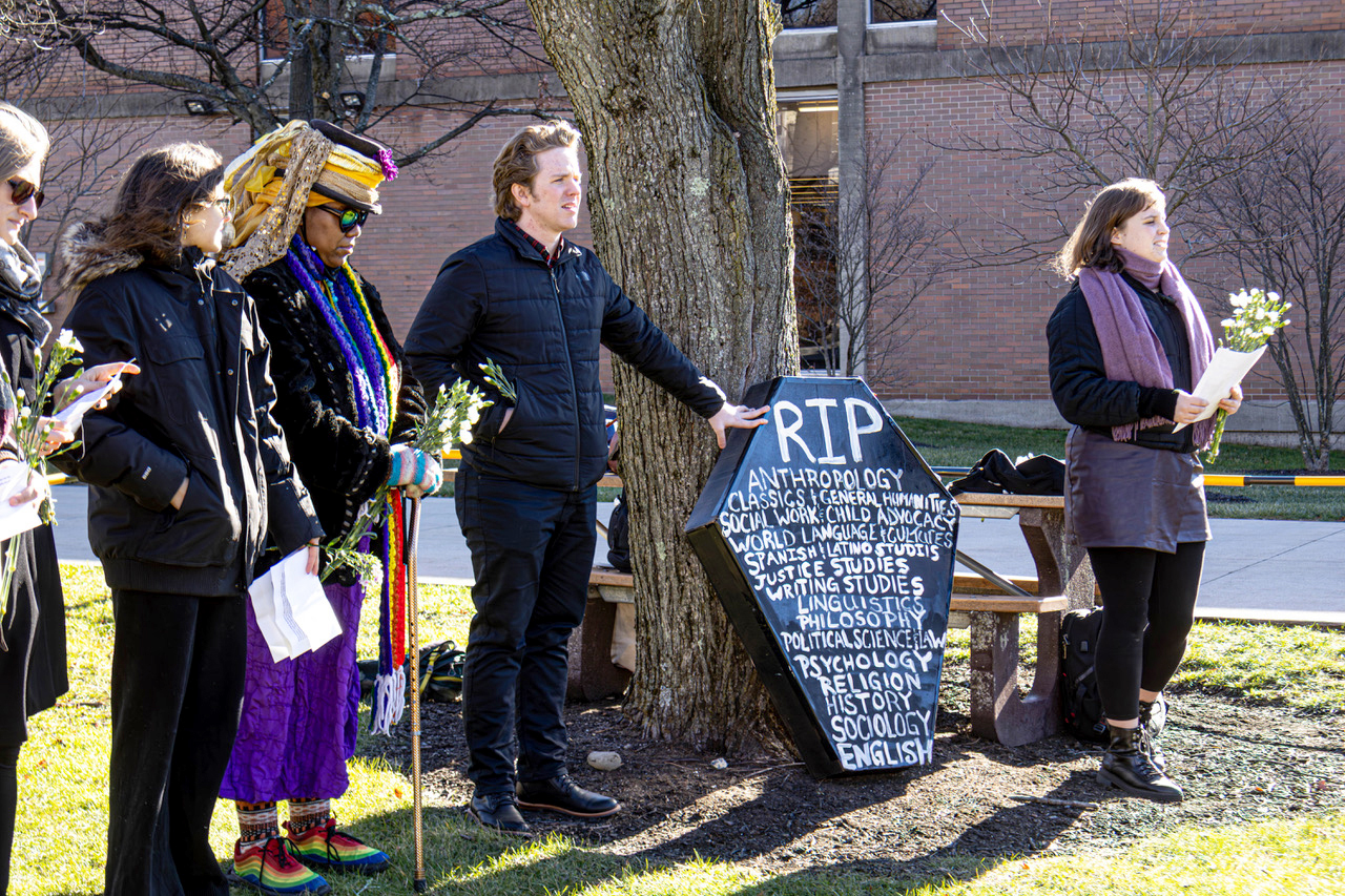 Montclair State University students host a mock wake and rally to keep humanities majors at the university.