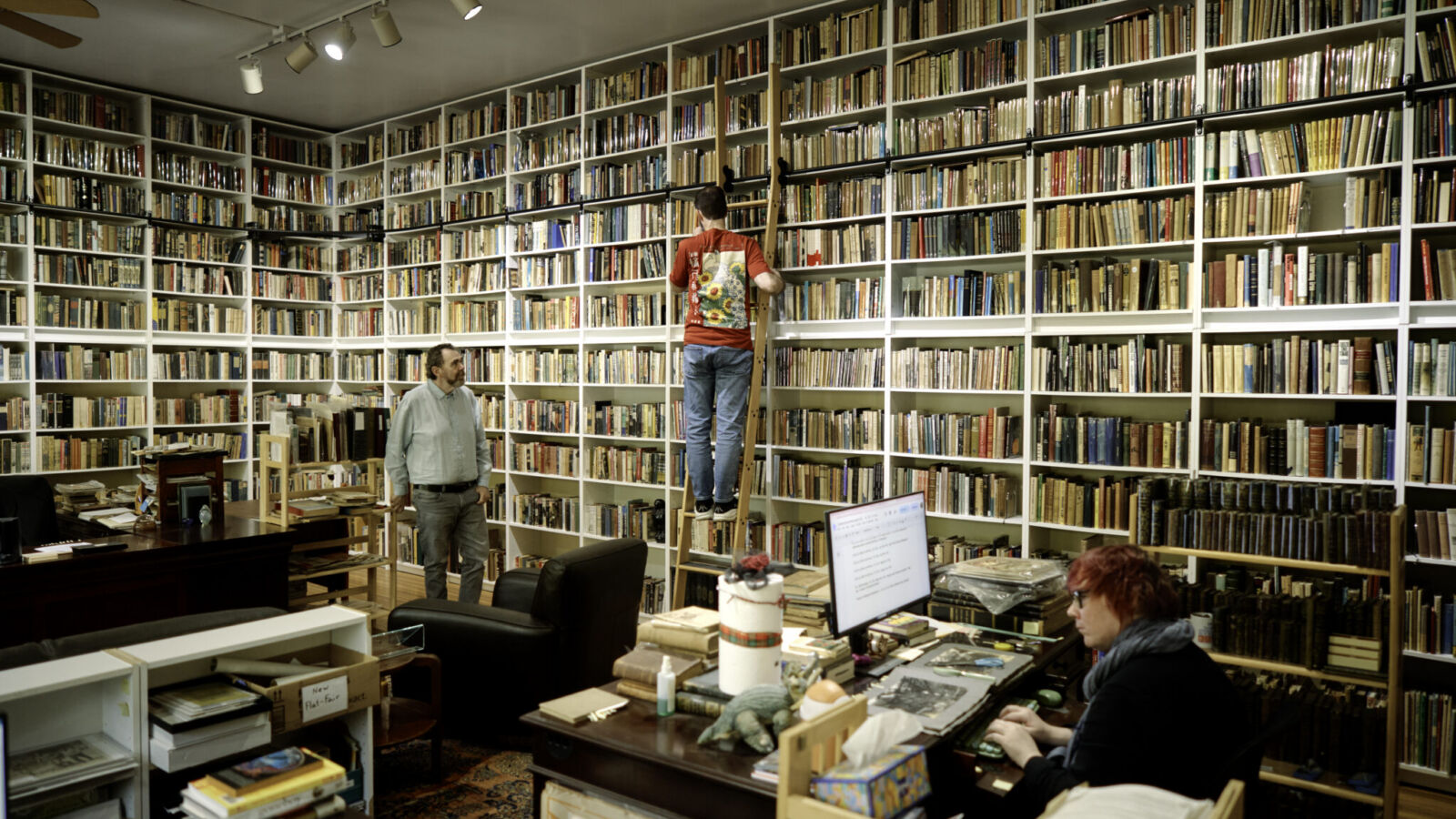 Employees at Between the Covers Rare Books in Gloucester City, NJ