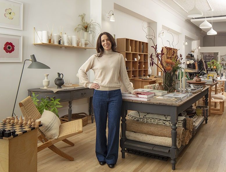 Danielle Zinn stands in her shop, Curated Home & Living in Montclair