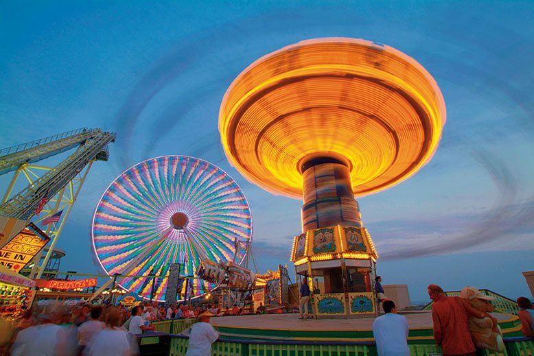 Rides on the boardwalk in Wildwood at dusk