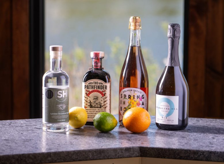 Bottles of botanicals and citrus at Catbird in Asbury Park